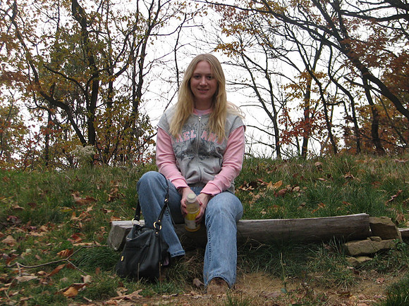 Lara resting on a bench