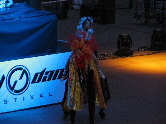 Cool girl riding a costumed person